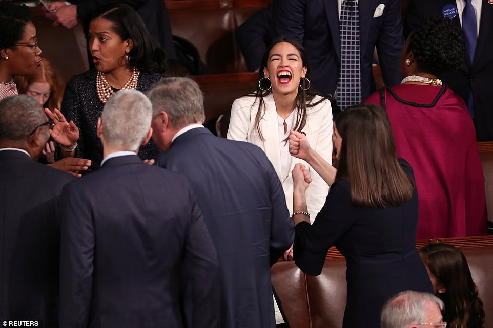 Fun time: The hard work is about to begin for members of Congress but Alexandria Ocasio-Cortez and other members of the Democratic caucus were happy to enjoy the opening